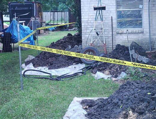 Amer Foundation Repair crew installing concrete piers on a Houston home
