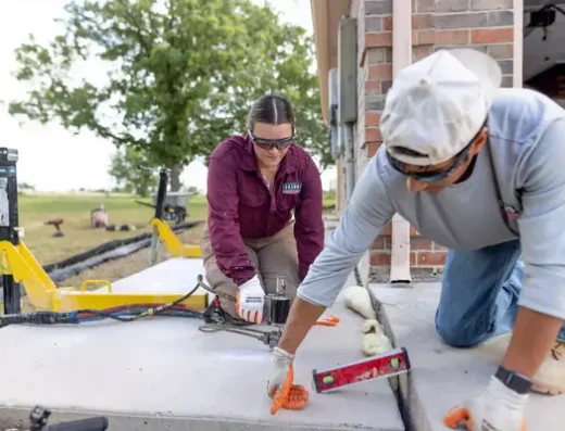 Baird Foundation Repair concrete crew lifting a slab with slabjacks and PolyLevel in Houston