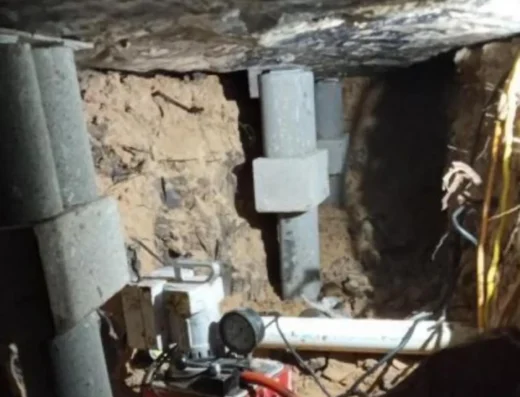 Hydraulic leveling equipment and supports beneath a residential structure