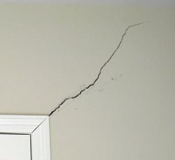 Diagonal wall crack from foundation settlement, the type of structural issue Jericho Foundation Repair addresses in Houston