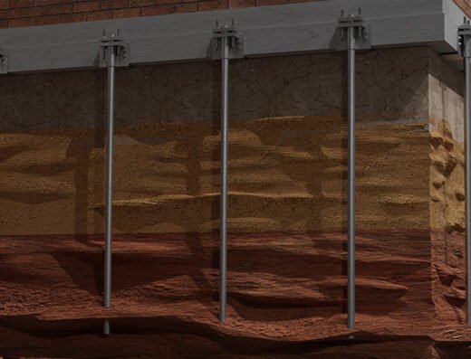 Steel foundation push piers used for underpinning in Houston Texas foundation repair, by Precision Foundation Services