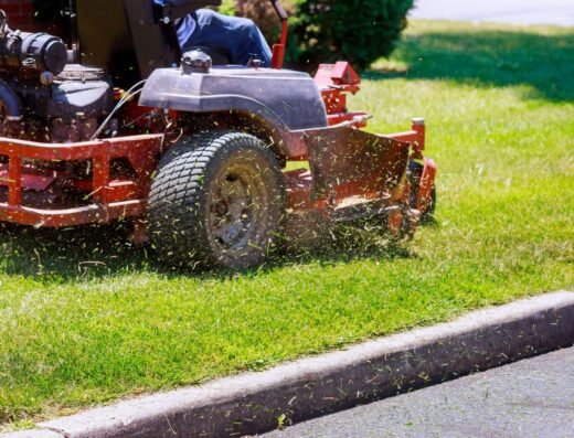The GroundsMen crew mowing a residential lawn in New Orleans