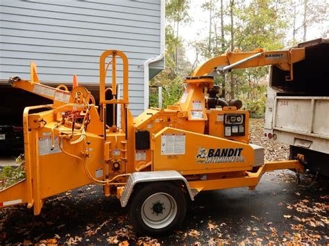 Excel Tree Care branded wood chipper equipment