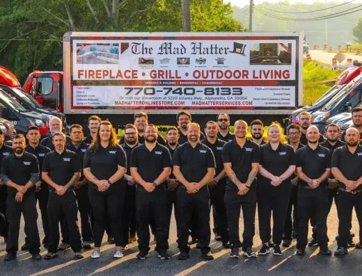 Mad Hatter Fireplace and Chimney team with branded service truck